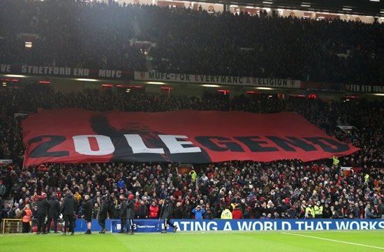 Man Utd fans unveil Ole Gunnar Solskjaer banner and chant sacked manager's name as new boss Ralf Rangnick looks on