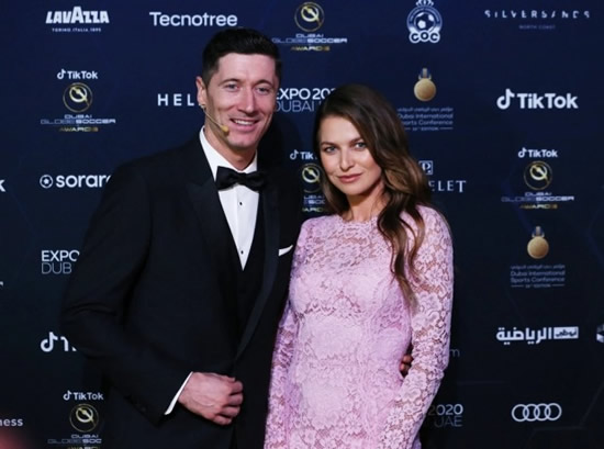 Suited up Lewandowski joined by wife Anna on red carpet at Globe Soccer Awards in Dubai with Mbappe also at glitzy bash