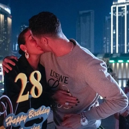 Cristiano Ronaldo shares loved-up kiss snap as Georgina Rodriguez shows off enormous bouquet of roses on Valentine's Day