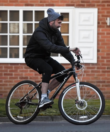 DEVIL IN DISGUISE Man Utd Premier League winner looks unrecognisable 15 years on as he rides bike after driving ban