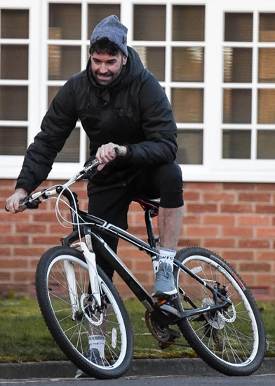 DEVIL IN DISGUISE Man Utd Premier League winner looks unrecognisable 15 years on as he rides bike after driving ban