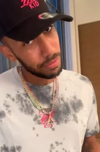 NOU BLING Pierre-Emerick Aubameyang splashes out on new diamond-encrusted necklace and matching ring in Barcelona’s kit colours