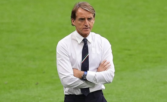 Italy coach Mancini declares he's staying