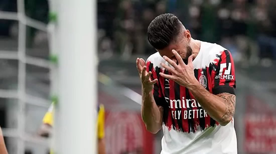 AC Milan held to draw with Bologna but stay top of Serie A