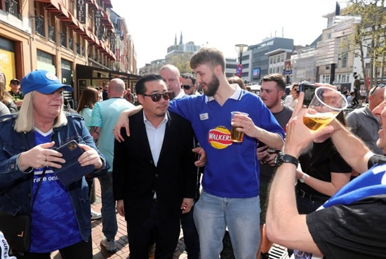 TOP MAN Beloved Leicester chairman Khun Top given hero’s welcome as he meets boozing fans in Eindhoven ahead of crunch PSV clash