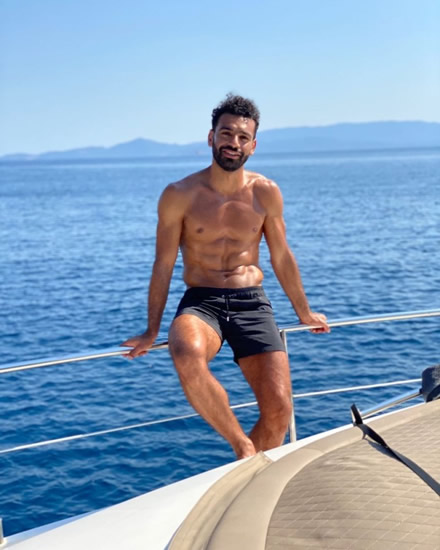 OFF THE COAST Ripped Mo Salah shows off six-pack on boat as Liverpool star returns to Egypt with future up in the air