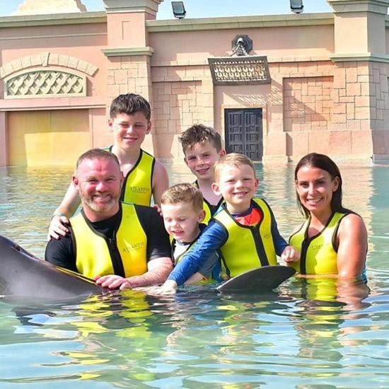 Wayne Rooney slammed for swimming with captive dolphins in Dubai