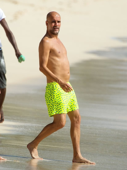 Manchester City boss Pep Guardiola, 51, looks tanned and toned on beach in Barbados