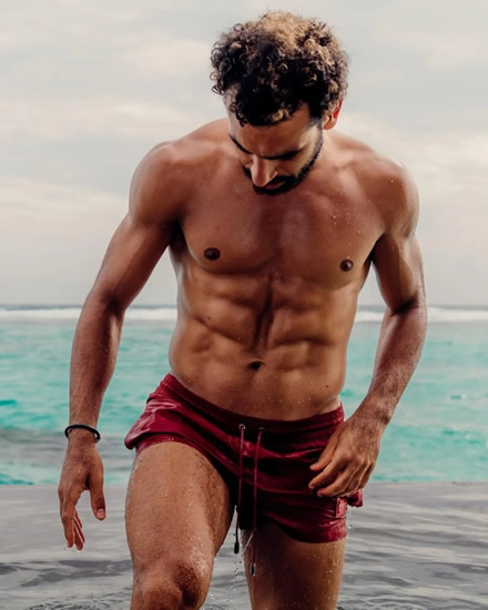 Mo Salah shows off washboard abs and incredible shape in trunks on holiday after signing £400k-a-week Liverpool contract