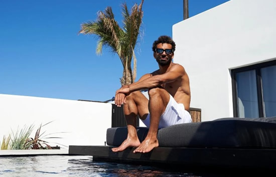 Mo Salah shows off washboard abs and incredible shape in trunks on holiday after signing £400k-a-week Liverpool contract