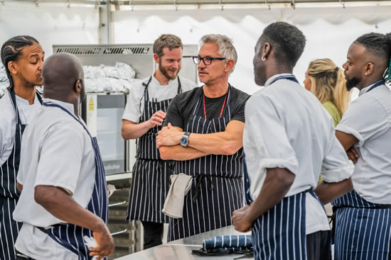 SNACKS OF THE DAY Gary Lineker celebrates his latest spectacular goal — cooking for 300 people at festival