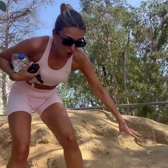 Jack Grealish's girlfriend Sasha Attwood poses in front of Hollywood sign and falls over on Los Angeles hike