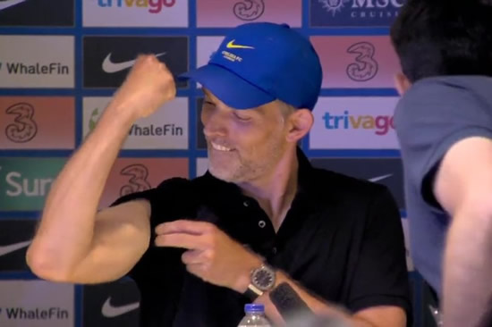 Thomas Tuchel flexes his muscles during press conference after squaring up to Antonio Conte