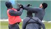 Queenbury rules ... Mario Balotelli and Jerome Boateng come to blows at Man City training