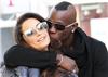 Nappy times ... Mario Balotelli with ex Raffaella Fico, who gave birth to their first child Pia this month
