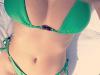 Curves ... Kelly Brook posts cheeky swimwear shot on Instagram