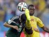 Cameroon's Stephane Mbia (17) heads the ball past Mexico's Andres Guardado