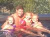FAMILY: Gerrard in the pool with his three children