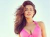 BIKINI BABE: Kelly looks pretty as a picture in a gorgeous pink bikini