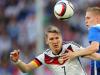 Schweinsteiger challenges Aron Johannsson for the ball as Germany had the brighter start to the game