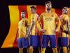 Messi, Neymar, Suarez, Iniesta and Pique model the kit which replaces last season's luminous yellow number.