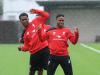 Andre Wisdom with contract rebel Raheem Sterling before he 'stayed away'