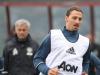 Jose Mourinho keeps an eye on Ibrahimovic during his first training session